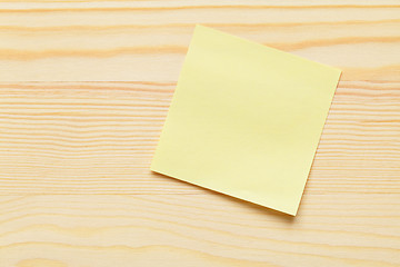 Image showing Sticky memo over wooden background