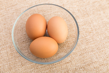 Image showing Brown egg in bowl