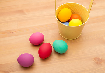 Image showing Painted easter egg in bucket