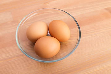 Image showing Brown egg in bowl