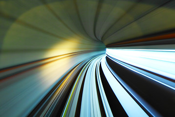 Image showing Fast moving train trail in tunnel