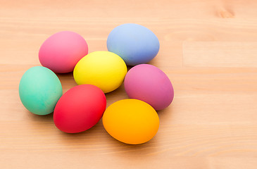 Image showing Painted easter egg over wooden texture