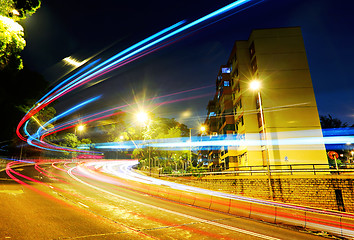 Image showing Fast moving car light on road