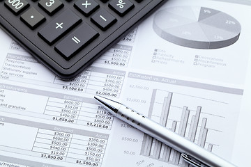 Image showing Graphical chart with pan and calculator