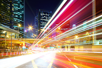 Image showing Fast moving car light in city at night