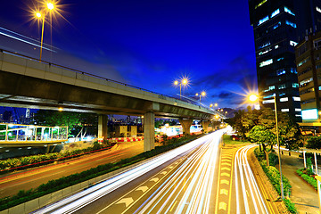 Image showing Modern city with car light