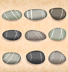 Image showing Sea pebbles collection on sand background