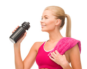 Image showing sporty woman with special sportsman bottle