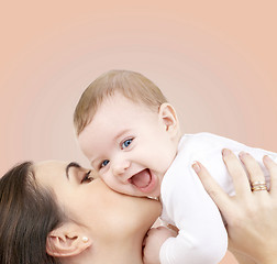 Image showing laughing baby playing with mother