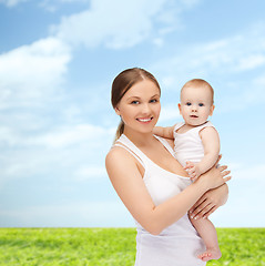 Image showing happy mother with adorable baby