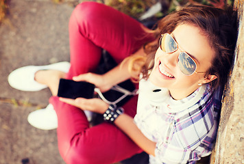 Image showing girl with headphones listening to music