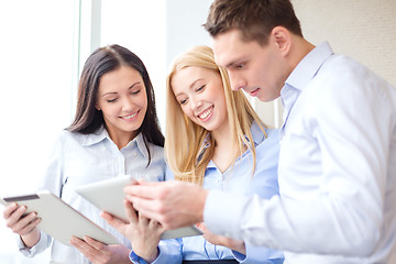 Image showing business team working with tablet pcs in office