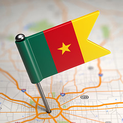 Image showing Cameroon Small Flag on a Map Background.