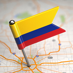 Image showing Colombia Small Flag on a Map Background.