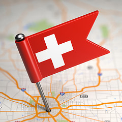 Image showing Switzerland Small Flag on a Map Background.