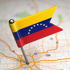 Image showing Venezuela Small Flag on a Map Background.