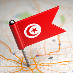 Image showing Tunisia Small Flag on a Map Background.