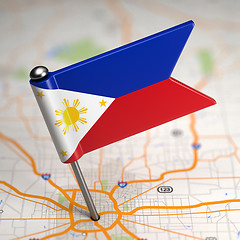 Image showing Philippines Small Flag on a Map Background.