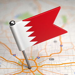 Image showing Bahrain Small Flag on a Map Background.