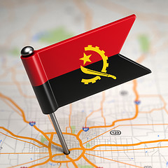 Image showing Angola Small Flag on a Map Background.