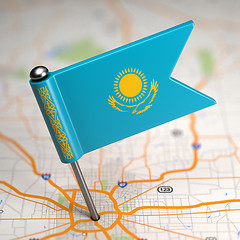 Image showing Kazakhstan Small Flag on a Map Background.