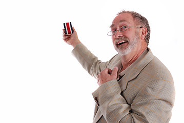 Image showing Comical professor gesturing with white board eraser