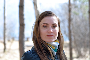 Image showing Woman black leather jacket in the park