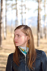 Image showing Woman black leather jacket in the park