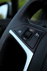 Image showing speed limitation on a steering wheel in modern car