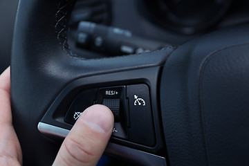 Image showing speed limitation on a steering wheel in modern car