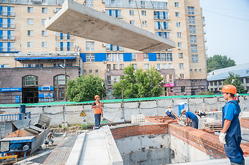 Image showing Workers on residental house construction