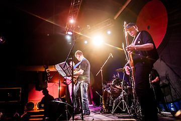 Image showing Band performs on stage in a nightclub