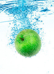 Image showing Green Apple in the Water.