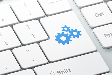 Image showing Advertising concept: Gears on computer keyboard background