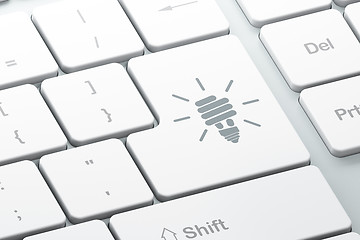 Image showing Business concept: Energy Saving Lamp on computer keyboard backgr