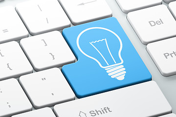 Image showing Finance concept: Light Bulb on computer keyboard background