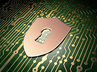 Image showing Privacy concept: Shield With Keyhole on circuit board background
