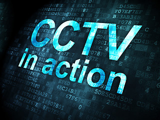 Image showing Protection concept: CCTV In action on digital background