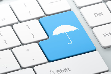 Image showing Privacy concept: Umbrella on computer keyboard background