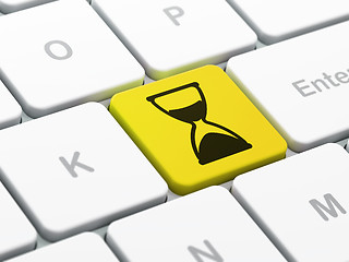 Image showing Time concept: Hourglass on computer keyboard background