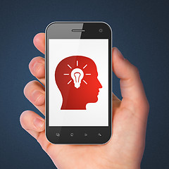 Image showing Education concept: Head With Light Bulb on smartphone