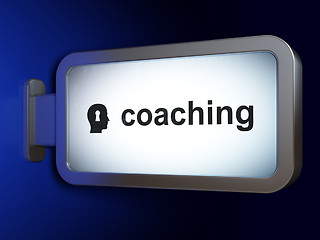 Image showing Education concept: Coaching and Head With Keyhole on billboard b