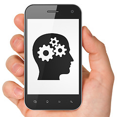 Image showing Marketing concept: Head With Gears on smartphone