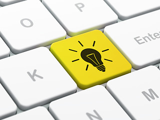 Image showing Finance concept: Light Bulb on computer keyboard background