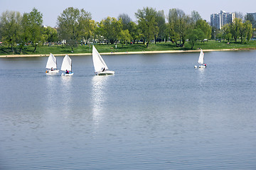 Image showing Small boats sailing