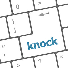 Image showing knock word on computer keyboard keys