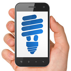Image showing Business concept: Energy Saving Lamp on smartphone