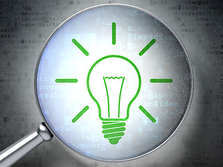 Image showing Finance concept:  Light Bulb with optical glass on digital backg