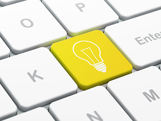 Image showing Finance concept: Light Bulb on computer keyboard background