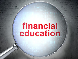 Image showing Education concept: Financial Education with optical glass on dig